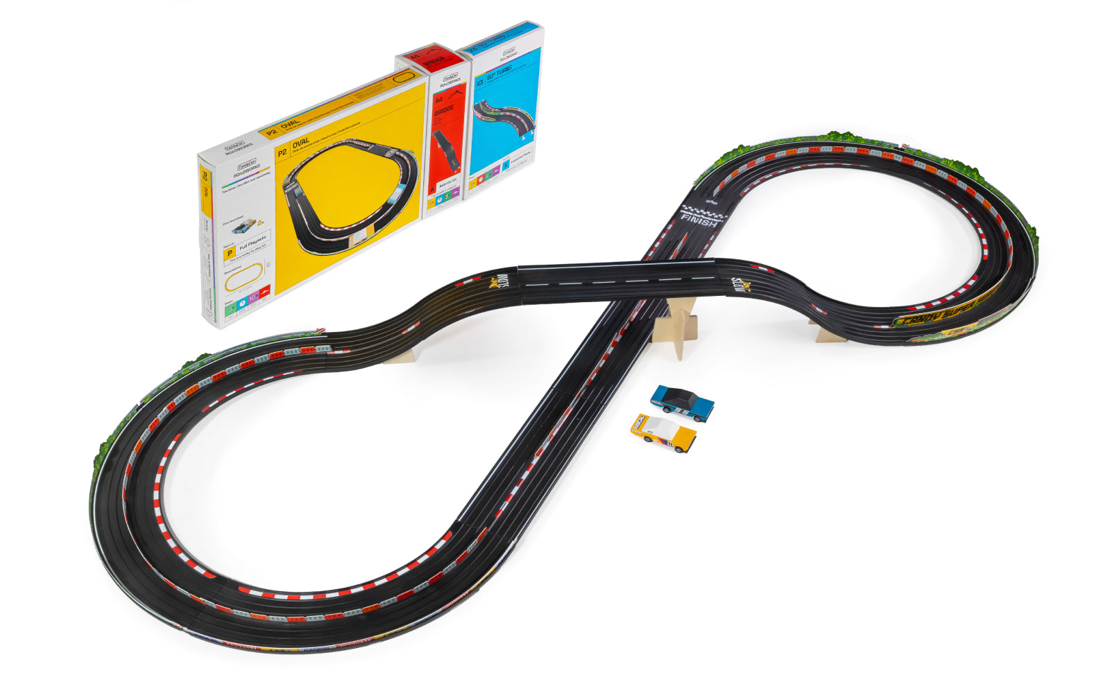 Image of Figure-8 Combo with packaging boxes, Rascal Rally Orange, and Rascal Rally Blue Toon car against white background