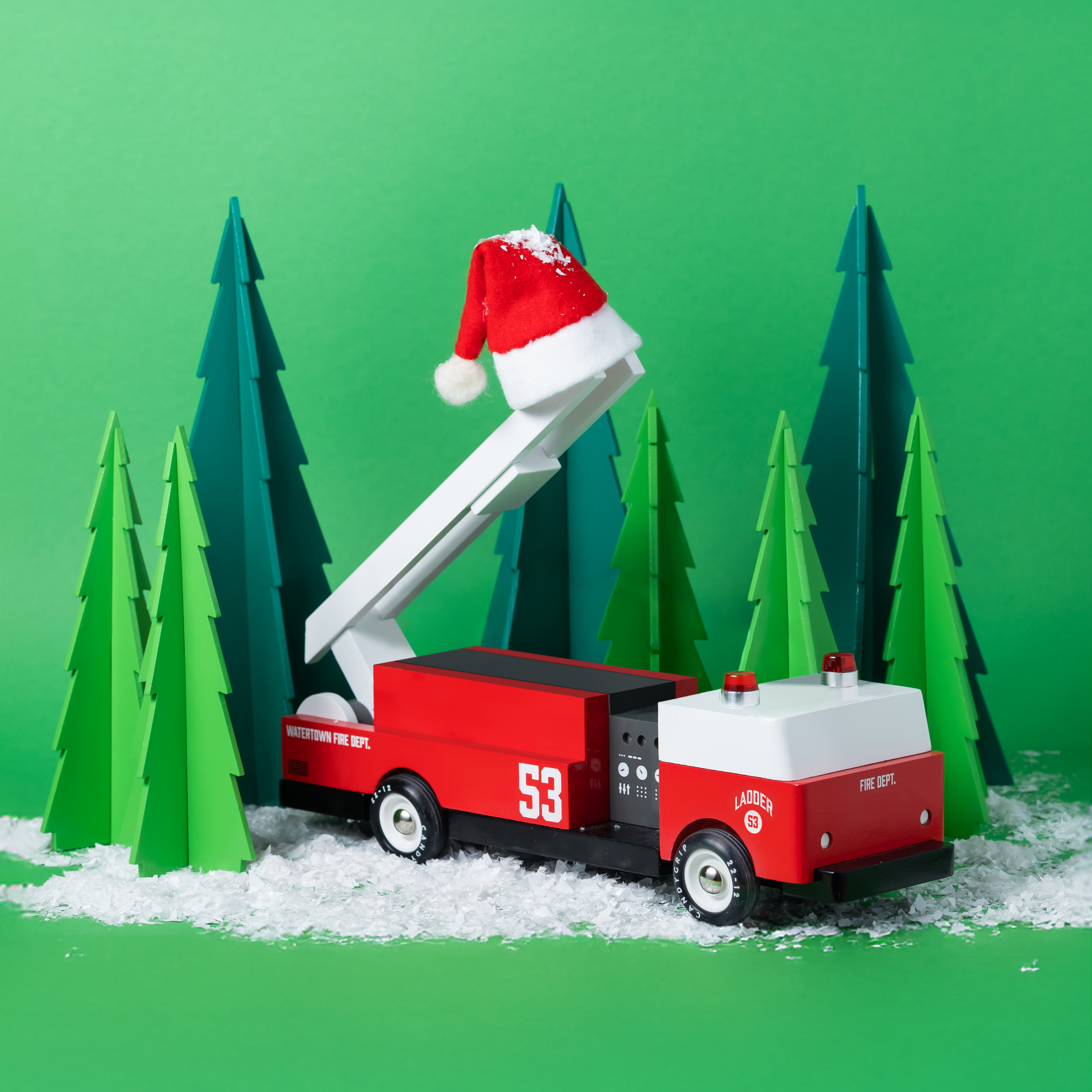 Lifestyle Christmas-themed image of Ladder 53 and Trees 3-Pack