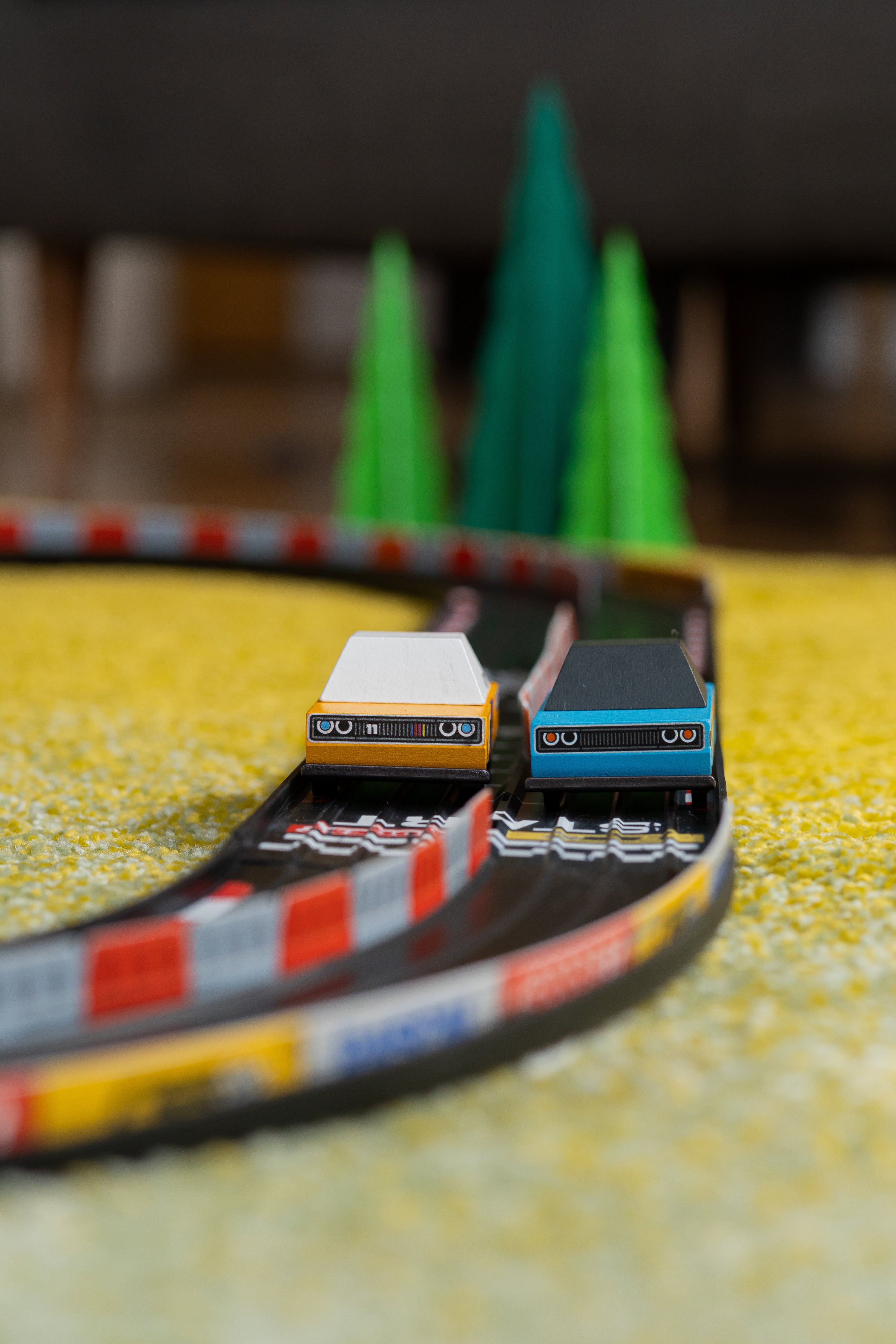 Lifestyle image of Oval Playset with Rascal Rally Blue and Orange