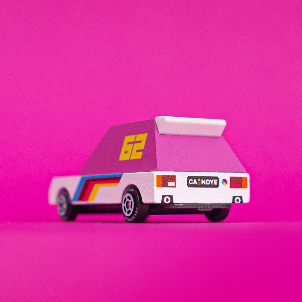 Quarter back angle of Pink Racer 62 Toon car against pink background