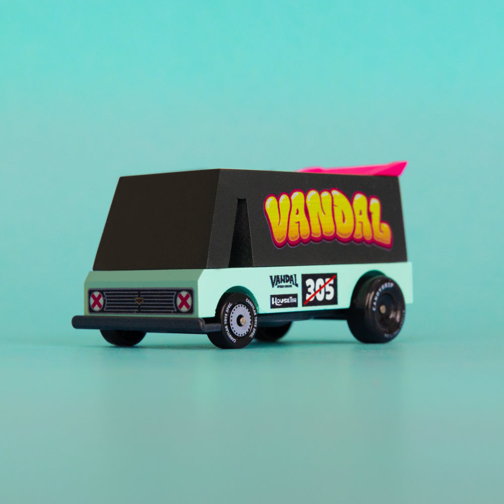 Quarter front angle of Vandal 305 Toon car against teal background